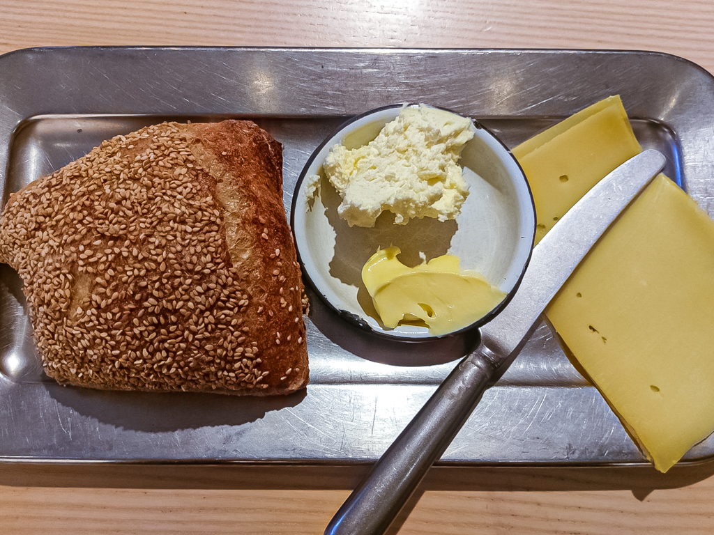 Hart Bageri Copenhagen - Sesame roll with butter, whipped cream and cheese 